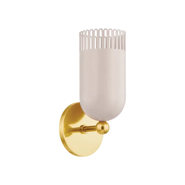 Zoe Feldman's Liba sconce combines timeless form with whimsical details. The warm neutral shade with pink undertones creates an inviting glow, while slender scalloped edges add visual interest. Aged Brass framework provides sophisticated contrast.