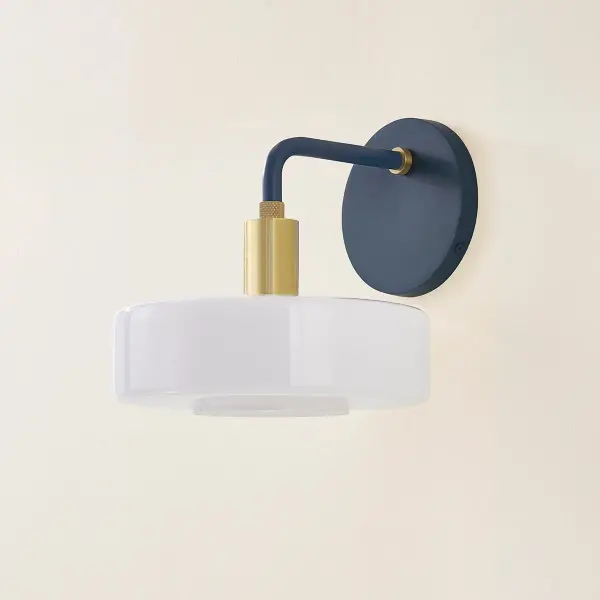 The Aston Wall Sconce combines geometric modern design with unexpected color through its distinctive Slate Blue glass shades and warm Aged Brass accents. Part of the Zoe Feldman collection, this fixture balances contemporary aesthetics with timeless appeal. - alternate view
