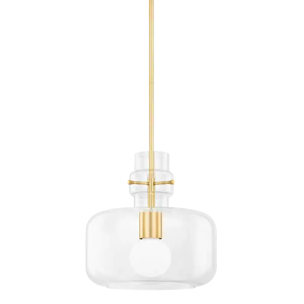 The Lumi Pendant brings fresh, minimalist style with its unique single-piece glass shade and sleek Aged Brass frame. Decorative pins add jewelry-like interest to the clean silhouette, making it perfect for modern spaces.