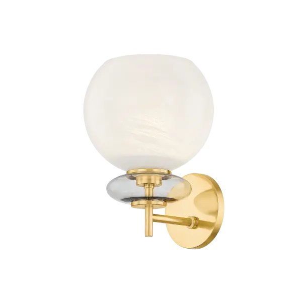 The Alexia Wall Sconce features a striking totemic design with a cloud glass orb stacked above an iridescent bubble, pierced by lustrous Aged Brass metalwork. This delicate yet charming fixture adds artistic sophistication to any space. - alternate view