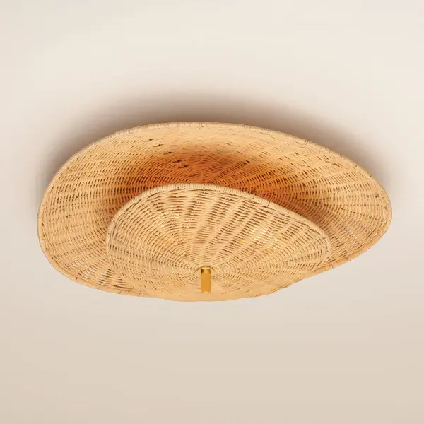 The Marigold Semi Flush combines natural rattan wicker with aged brass accents for a warm, organic aesthetic. Its layered triangular shades create ambient glow while the brass rod adds contemporary contrast.
