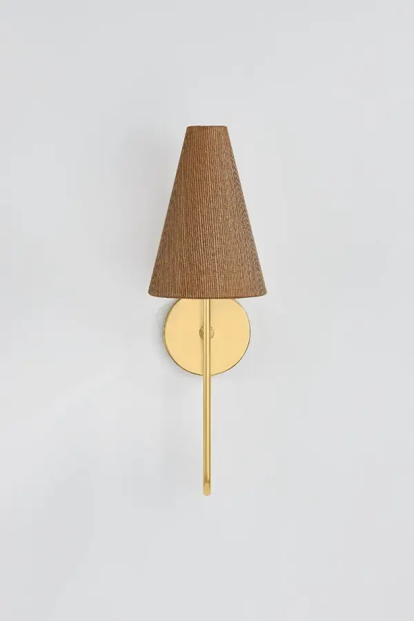 The Jessel Wall Sconce beautifully bridges eras with sweeping Aged Brass arms and elongated grasscloth shades. Perfect for cottage-style interiors, it adds warmth and casual elegance to any space. - alternate view