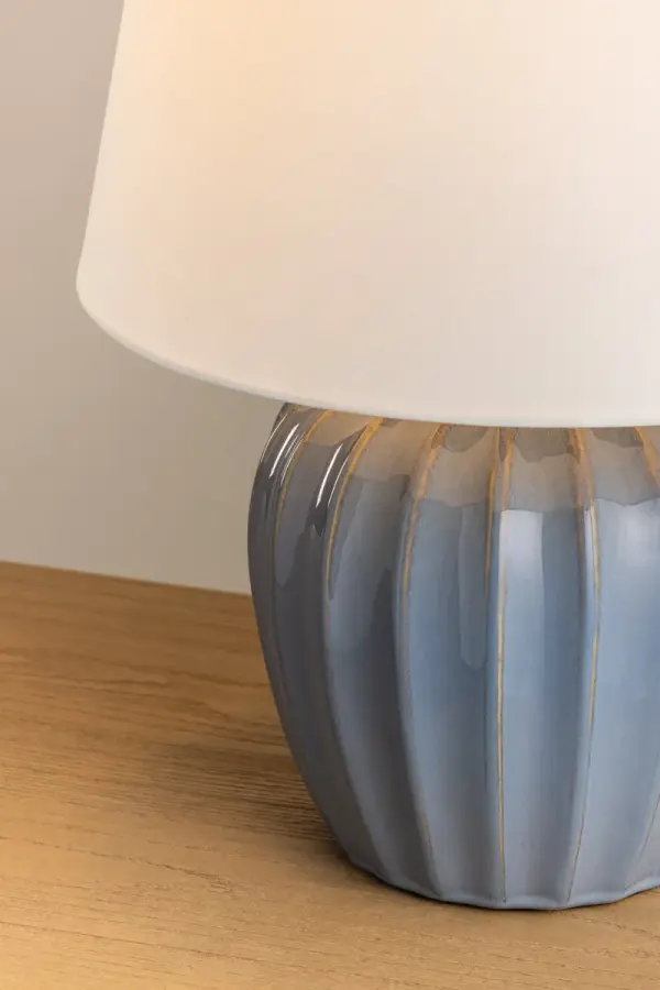 The petite Myla brings coastal charm with its Spring Lake reactive glaze and vertical ribbing. Perfect for bedside use, this accent lamp combines playful design with sophisticated Aged Brass hardware and a crisp white linen shade. - alternate view