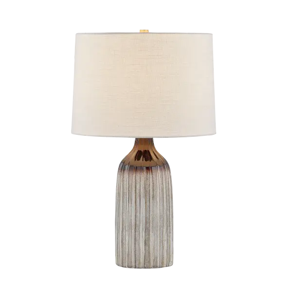 The Raisa table lamp showcases stunning reactive glaze artistry with mocha-to-white ombre tones cascading over a fluted ceramic base. Each piece is unique with hand-applied glazing that creates depth and dimension.