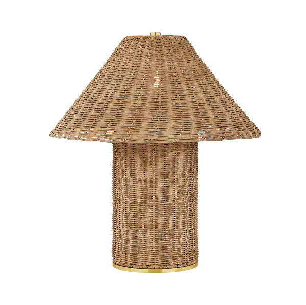 The Jeanette table lamp combines natural woven wicker with aged brass accents for a bold, textural statement. Its sculptural silhouette and handcrafted appeal make it perfect for adding warmth and organic charm to bedrooms, living spaces, or offices.