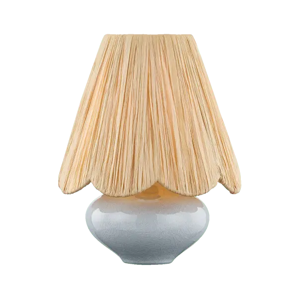 The Cailyn Table Lamp brings playful proportions and tactile appeal to any space. Its scalloped raffia shade and frost crackle ceramic base create a soft, approachable aesthetic with natural character.