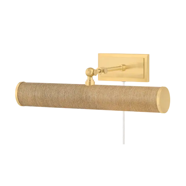 The Holly Picture Light combines traditional aged brass with natural grasscloth for a sophisticated look. Perfect for highlighting artwork or wall displays, this plug-in fixture offers focused illumination with style-forward design.