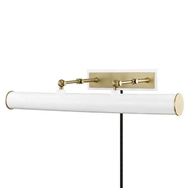 The Holly Picture Light combines aged brass warmth with a clean white shade to create focused illumination for artwork and displays. Its plug-in design offers installation flexibility without hardwiring.