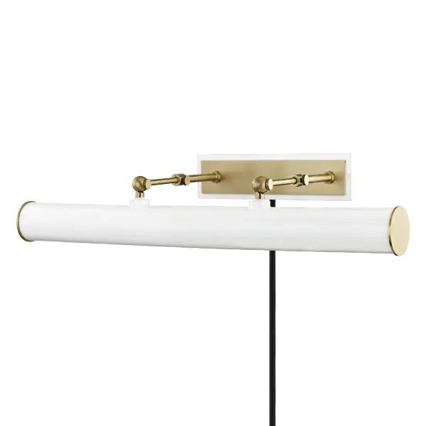 The Holly Picture Light combines aged brass warmth with a clean white shade to create focused illumination for artwork and displays. Its plug-in design offers installation flexibility without hardwiring. - alternate view