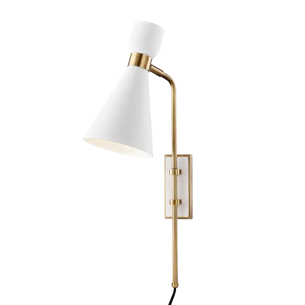 Lamp—As a table lamp, Willa is simply elegant. As a floor lamp, Willa is a striking addition to a space. Its oversized knob allows you to move the neck and head up and down, as well as lock it into position. Willa’s further adjustable at the base of the contrastingly cuffed shade. Sconce—Exuding mid-century modern vibes,Willa’s conical shade adjusts on an elegant swivel. Above the band, it forms a smooth cup with a matching metal detail. Perfect for those who like to keep things fresh, as well as for renters or apartment-dwellers, Willa plugs into an outlet, its contrasting backplate mountable like a framed print on the wall.