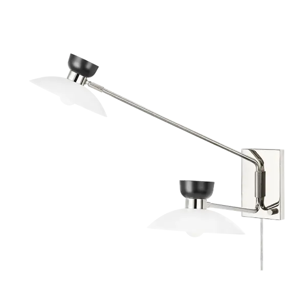 The Whitley combines artistic flair with practical functionality. Its black and white dual-finish shade creates visual interest while the swing arm design offers adjustable task lighting perfect for reading or desk work.