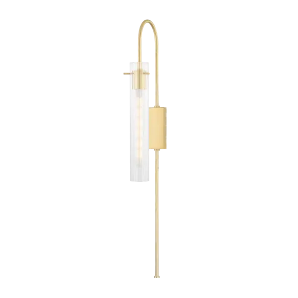 The Nettie Plug-In Sconce combines elegant simplicity with practical functionality. Its slender gooseneck arm and cylindrical glass shade create a refined look that works in any room without requiring hardwiring.