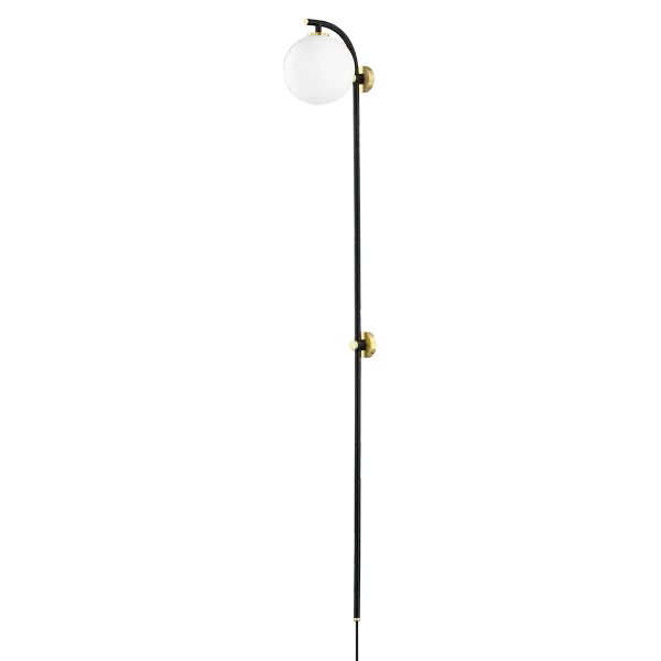 The Faye Plug-In Sconce combines a 3.5-foot tall profile with aged brass accents and an opal glass globe for subtle drama. Its plug-in design offers installation flexibility without hardwiring, perfect for renters or quick room updates.