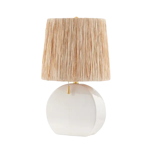 The Aneesa Table Lamp combines glossy crackle glaze ceramic with a sophisticated raffia-lined shade and delicate aged brass accents. This transitional piece brings coastal-inspired texture and minimalist jewelry-like details to any space.
