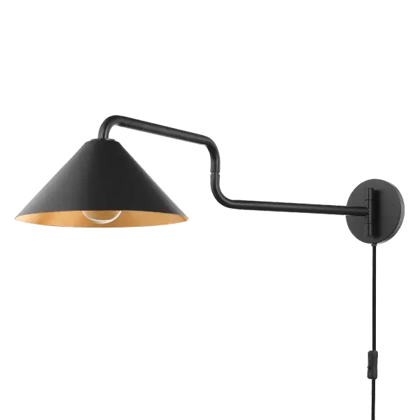 The Brianna sconce offers exceptional flexibility with both plug-in and hardwired installation options. Its conical shade features a striking black exterior with gold leaf interior, creating warm ambient lighting through an opaque diffuser.