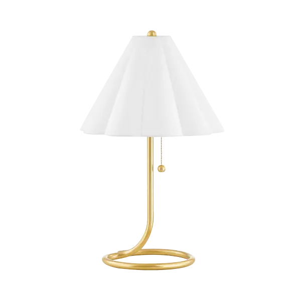 The Martha Table Lamp combines artistic form with practical function. Its twisted aged brass base creates visual interest while maintaining a compact footprint, making it perfect for smaller spaces that need personality.