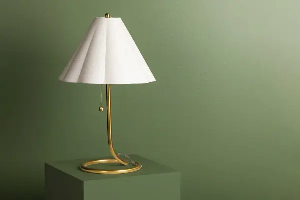 Sculptural Brass Lamp with Artistic Flair and Space-Saving Design - Image 3