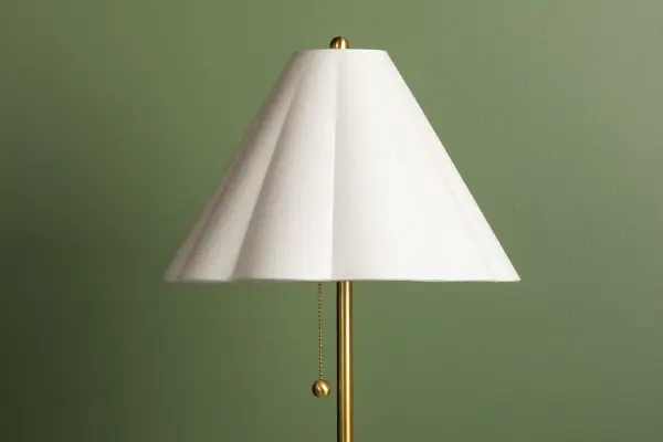 Sculptural Brass Lamp with Artistic Flair and Space-Saving Design - Image 4