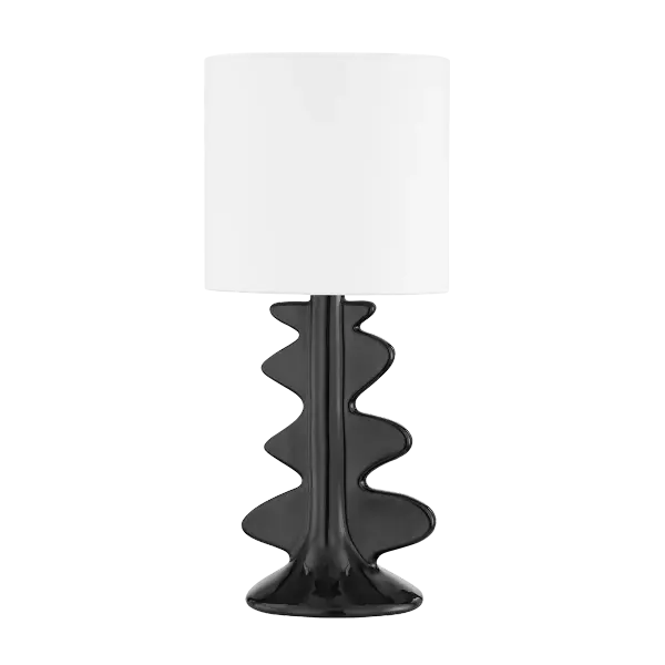 The Liwa Table Lamp combines abstract art with functional lighting. Its smooth, fluid ceramic base creates visual interest while maintaining a slim profile perfect for smaller spaces. The crisp white linen drum shade complements the glossy finish beautifully.