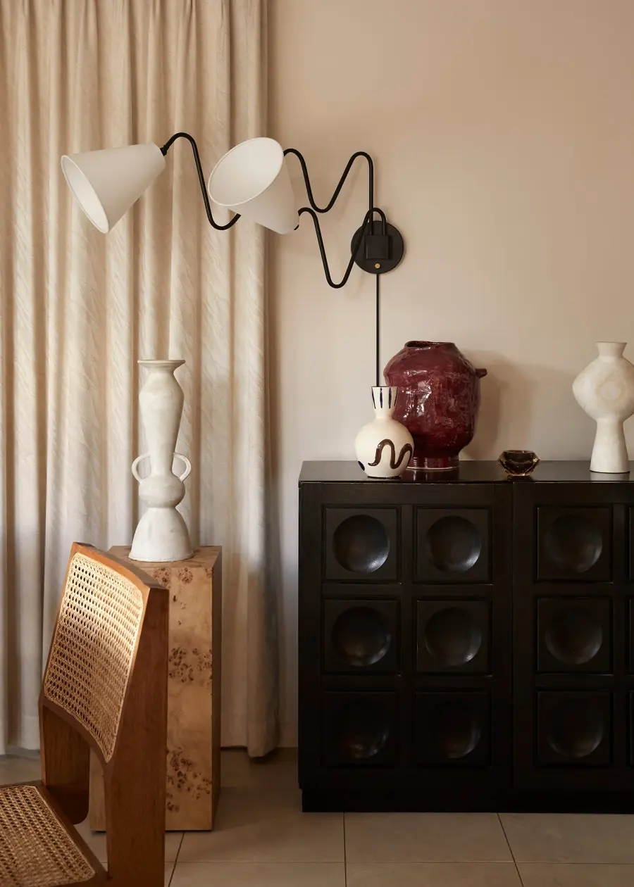 Playful Contemporary Sconce with Pivoting Shades and Designer Pedigree - Image 6