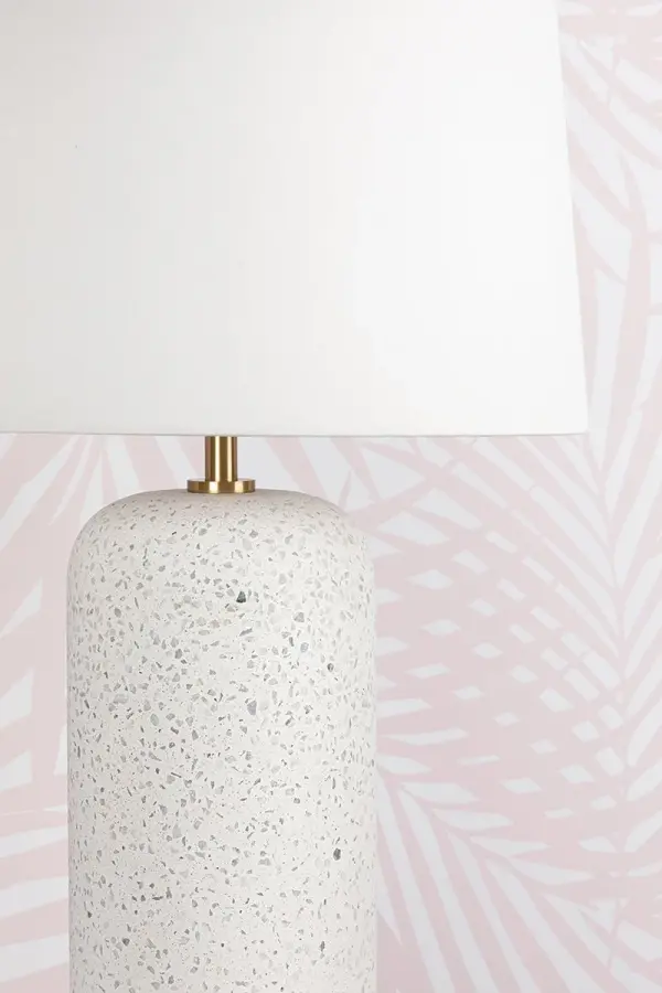 The Margaret Table Lamp showcases casual blue-grey terrazzo with Megan Molten's signature aesthetic, complemented by sophisticated Aged Brass accents. Perfect for adding welcoming ambiance to entryways or as coordinated pairs. - alternate view