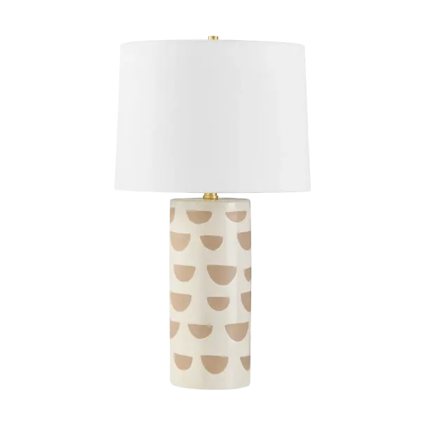 The Minnie Table Lamp brings playful sophistication with its glossy ceramic base featuring geometric patterning and aged brass accents. Part of the Megan Molten x Mitzi collaboration, it adds artisanal charm to any space.