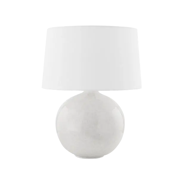 The Karina Table Lamp combines classic design with modern versatility. Its reactive glaze ceramic base and crisp white linen shade create a sophisticated look that complements any décor style.
