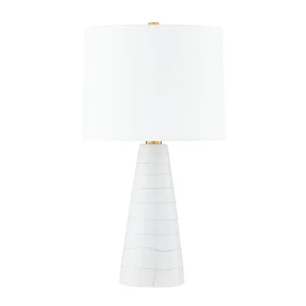 A hand-painted, uneven grid pattern gives this table lamp a fun and fresh style with a whimsical feel. The Satin White Ceramic base is topped by a white linen drum shade for a clean, neutral palette that works well with any interior. Aged Brass accents at the neck and finial add a glimmer of metal. Melinda adds just the right bit of whimsy to tabletops throughout the home. Collection: Melinda Designer: Mitzi Finish: Aged Brass/Ceramic Satin White Glass: White Width: 13.75" Height: 25.75" Length: 5.25" Weight: 5.50 lb Number of Bulbs: 1 Maximum Wattage: 15.00 W Bulb Type: A19 Bulb Base: E26 Medium Voltage: 120.00 V Material: Ceramic Country of Origin: VN Safety Listing: UL Safety Rating: Dry Switch: On/Off Switch On Socket Manufacturer Warranty: 1 Year Limited Manufacturer Spec Sheet Instructions