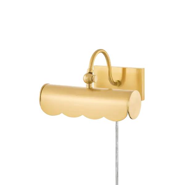 The Fifi Picture Light brings fresh traditional style to artwork display with its charming scalloped edge and curved arm. Part of the Ariel Okin collaboration, this plug-in fixture offers easy installation and designer appeal.