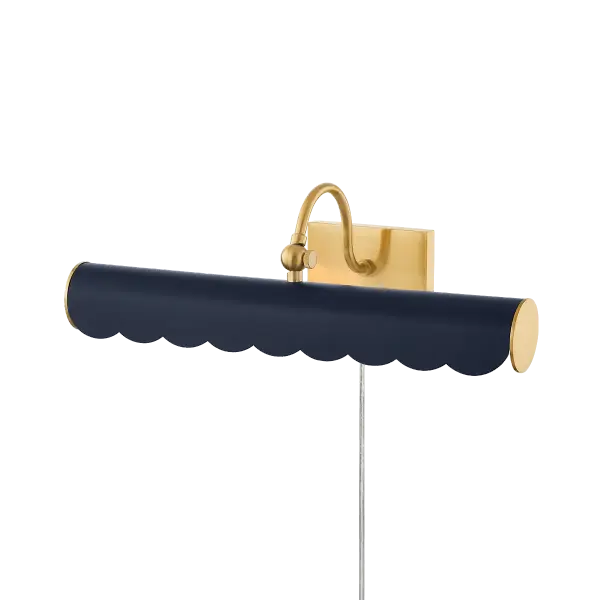 The Fifi Picture Light brings warmth and sophistication to artwork displays with its charming scalloped edge and curved arm design. Part of the Ariel Okin collaboration, this plug-in fixture offers easy installation.