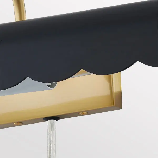 The Fifi Picture Light brings warmth and sophistication to artwork displays with its charming scalloped edge and curved arm design. Part of the Ariel Okin collaboration, this plug-in fixture offers easy installation. - alternate view