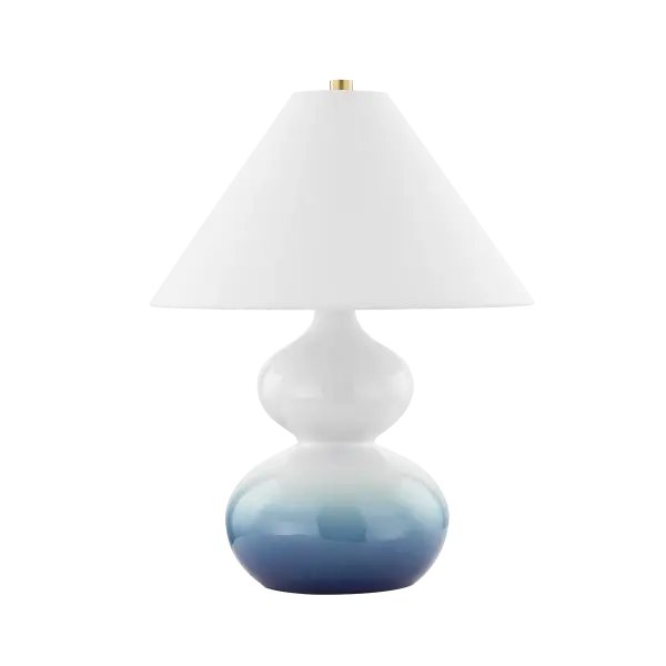 The Aimee Table Lamp brings artisanal sophistication with its hourglass ceramic base featuring a soothing blue ombre finish. Part of the exclusive Ariel Okin collaboration, it pairs sculptural appeal with transitional versatility.