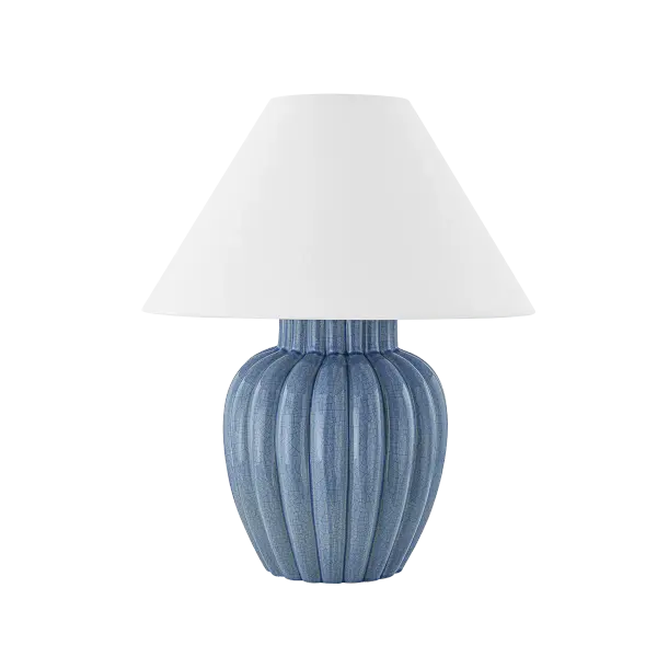 This stunning table lamp features crackled ceramic with dimensional blue glazing and classic fluted detailing. Part of the exclusive Ariel Okin x Mitzi collaboration, it combines timeless silhouette with contemporary texture.