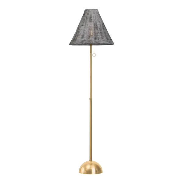 The Destiny Floor Lamp beautifully combines natural gray wicker with polished Aged Brass, creating a warm, earthy glow perfect for coastal and organic modern interiors. Its handcrafted nature ensures each piece is unique.