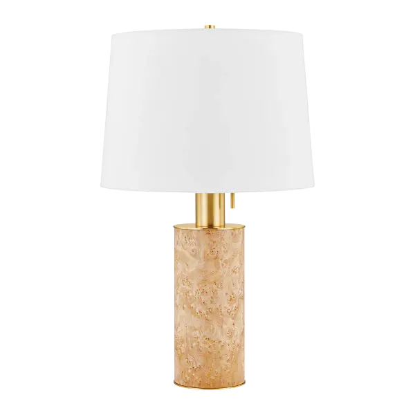 The Clarissa Table Lamp showcases natural burl wood veneer in a modern silhouette, complemented by oversized aged brass hardware and a classic white linen shade. Each piece is unique due to natural wood variations.