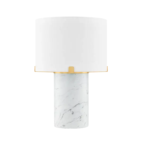 The Rumi Table Lamp combines natural Carrara marble with Aged Brass accents for an elevated, petite design. Each piece features unique veining patterns, making it a one-of-a-kind statement for bedside or desk applications.