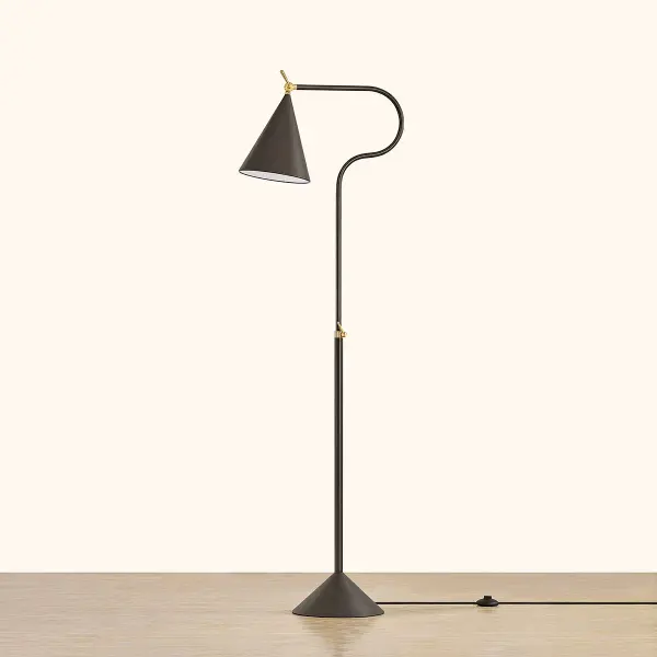 The Harriet Floor Lamp combines geometric shapes with mixed metals for a sophisticated modern aesthetic. Its telescoping neck with swivel adjustments offers customizable height and direction, making it ideal for task lighting. - alternate view