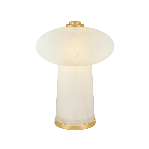 The Fords rechargeable table lamp combines playful seeded glass with refined Aged Brass accents, creating a versatile accent piece perfect for smaller spaces. Its cordless LED design offers flexibility and modern convenience.