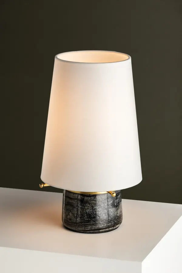 Central Valley combines architectural elegance with modern functionality. The dark-honed Nero Madera marble base provides substantial weight and luxury, while distinctive brass spokes create jewelry-like detail. Rechargeable design eliminates cords for flexible placement. - alternate view