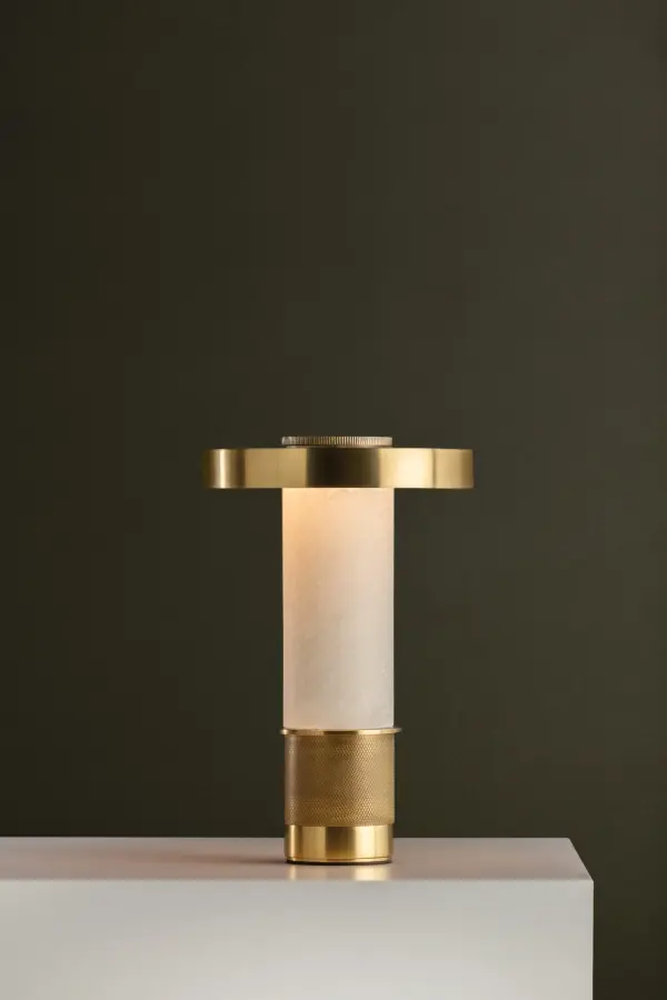 The Sefton combines refined alabaster with machined brass metalwork in a compact, rechargeable design. Perfect for adding ambient lighting anywhere without cords, this dimmable mini lamp offers 3.5-hour charging and flexible brightness control. - alternate view