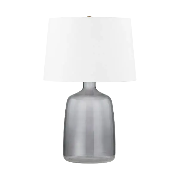 The Artesia Table Lamp blends vintage charm with contemporary style through its sculptural smoked plated glass base and Patina Brass accents. The neutral palette and organic silhouette make it versatile for modern interiors.