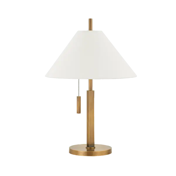 The Clic Table Lamp combines clean geometric forms with classic materials. Its square body, circular base, and tapered linen shade create visual interest, while the patina brass finish adds warmth and sophistication to any space.