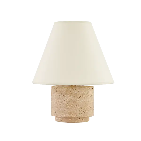 The Bronte Table Lamp combines natural travertine stone with refined brass detailing for an earthy yet sophisticated aesthetic. Its tapered paper shade creates warm ambient lighting while highlighting the stone's unique texture.