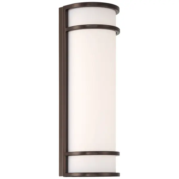 The Cove LED wall mount combines contemporary design with practical outdoor lighting. Its integrated LED technology and dual voltage capability make it versatile for various installations, while the bronze finish adds warmth.