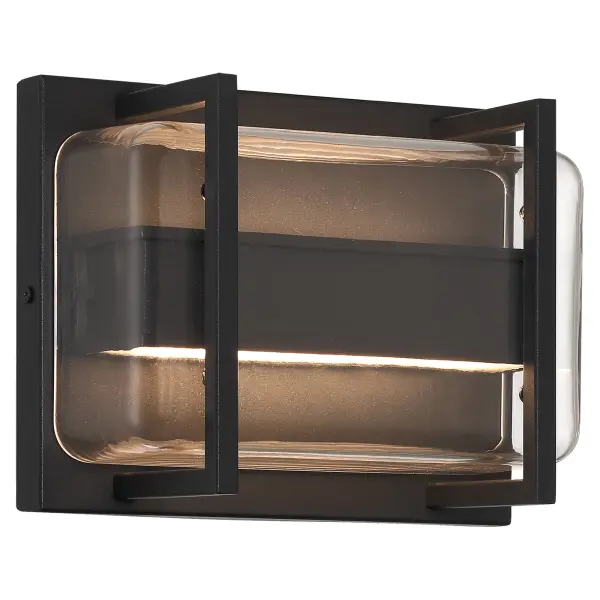 The Dillon LED wall sconce delivers efficient, energy-compliant outdoor lighting with a contemporary black finish. Its bi-directional design creates dramatic up and down lighting effects while integrated LEDs provide 842 lumens of warm 3000K light.