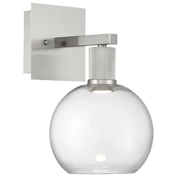 The PORT NINE Burgundy LED Wall Sconce combines energy-efficient integrated LED technology with a sleek brushed steel finish. Its reversible design allows mounting bulb up or down, while the 3000K warm white light creates inviting ambiance.
