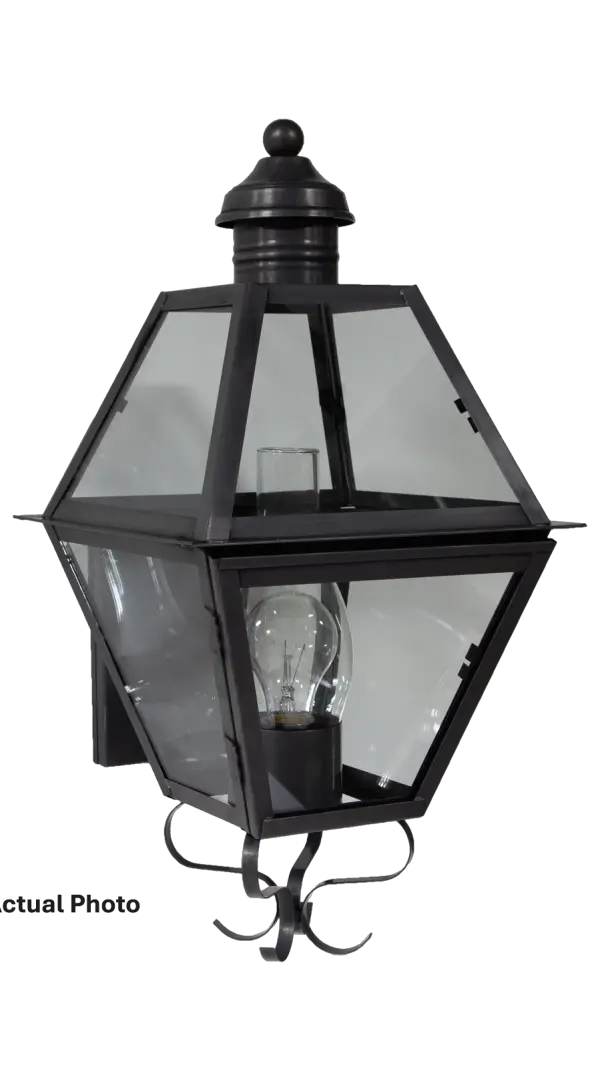 Inspired by the birthplace of the American Revolution, the classic old-style Boston collection beautifully combines historical aesthetics with modern techniques. Its handcrafted appearance, straightforward lines, and unembellished designs are timeless. Small Boston Wall Light Dimensions: 10.25"W x 12.25"D x 19"H Mounting height (From top to mounting bracket): 12.5" Bulb type: Two 60-Watt Candelabra or One 75-Watt Medium with Clear Chimney Suitable location: Wet Mounting Area: 4.5"W x 8"H Contact Dealer for Pricing & Availability Download Spec Sheet Note: Some photos are a digital rendering to show our finish, glass and socket options our actual finishes are hand-applied and our glass is hand-blown and will have natural variations from the photos. - alternate view
