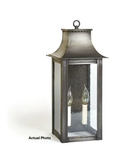 The Coplin collection unites updated elements with time tested details. The rectangle frame with a hole punched pagoda top featuring a loop as a finishing touch, with an open bottom for added illumination.