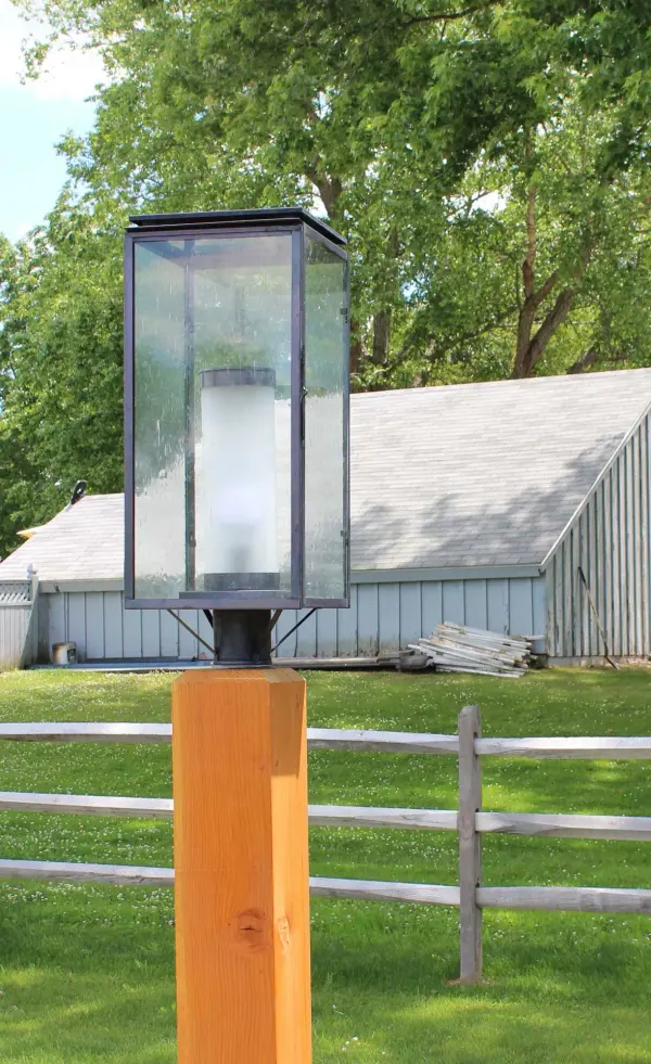 The Downtown collection offers a modern and versatile look. Using straight lines to form its frame, the look is softened by glass panels that enclose the fixture and offer plenty of light. This is a perfect addition to any home or space. - alternate view