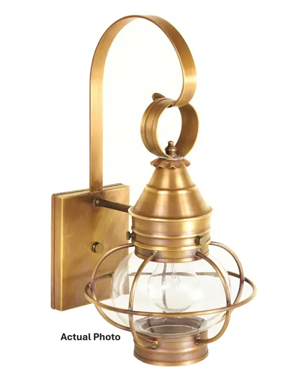 Evoking the classic lanterns from New England's rich nautical history, the Caged Onion collection features an iconic shape with a handcrafted brass or copper cage, protecting the hand-blown glass globe. Crafted with a detachable globe, they are easy